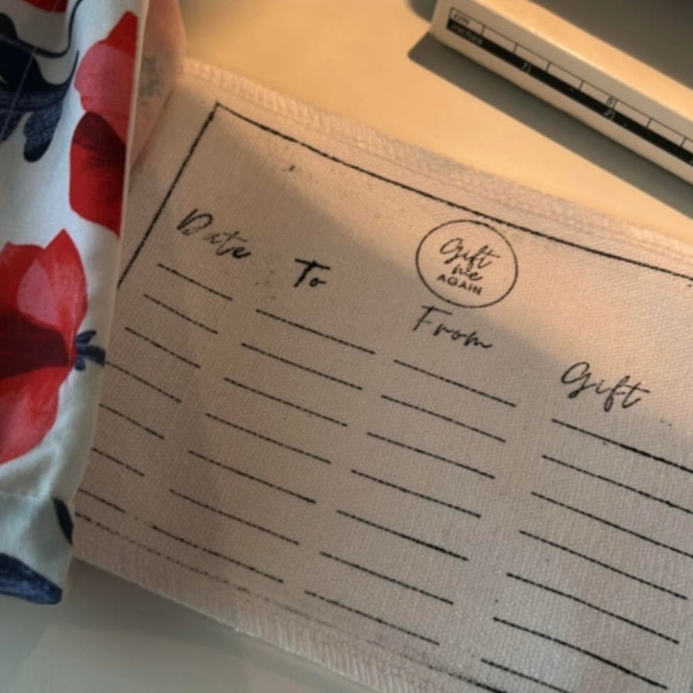 A prosperity tag from the inside of a fabric gift bag