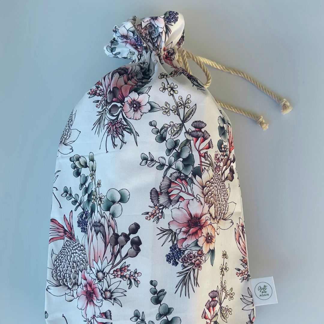 Floral drawstring bag on a light gray background