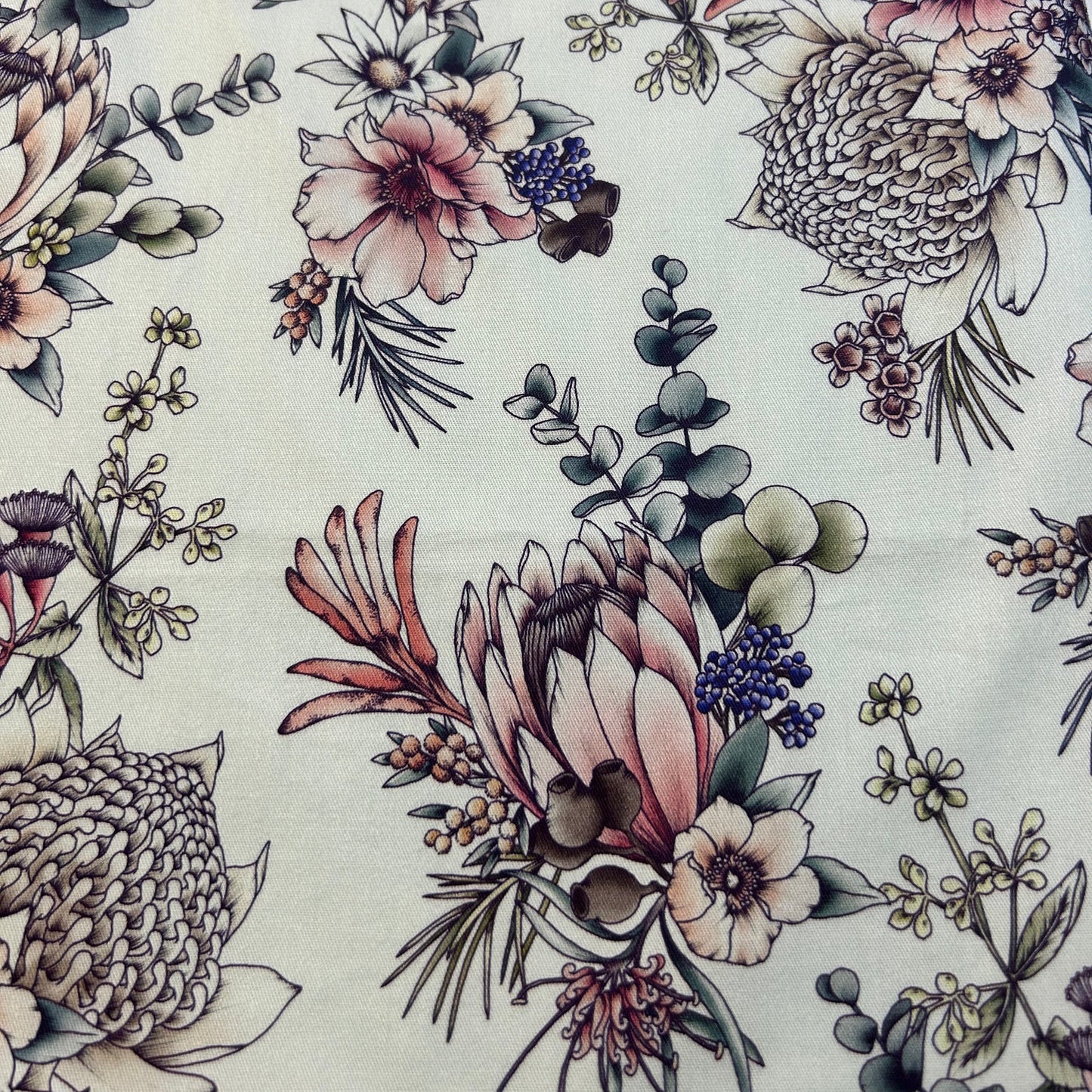 Floral and botanical pattern on a fabric background